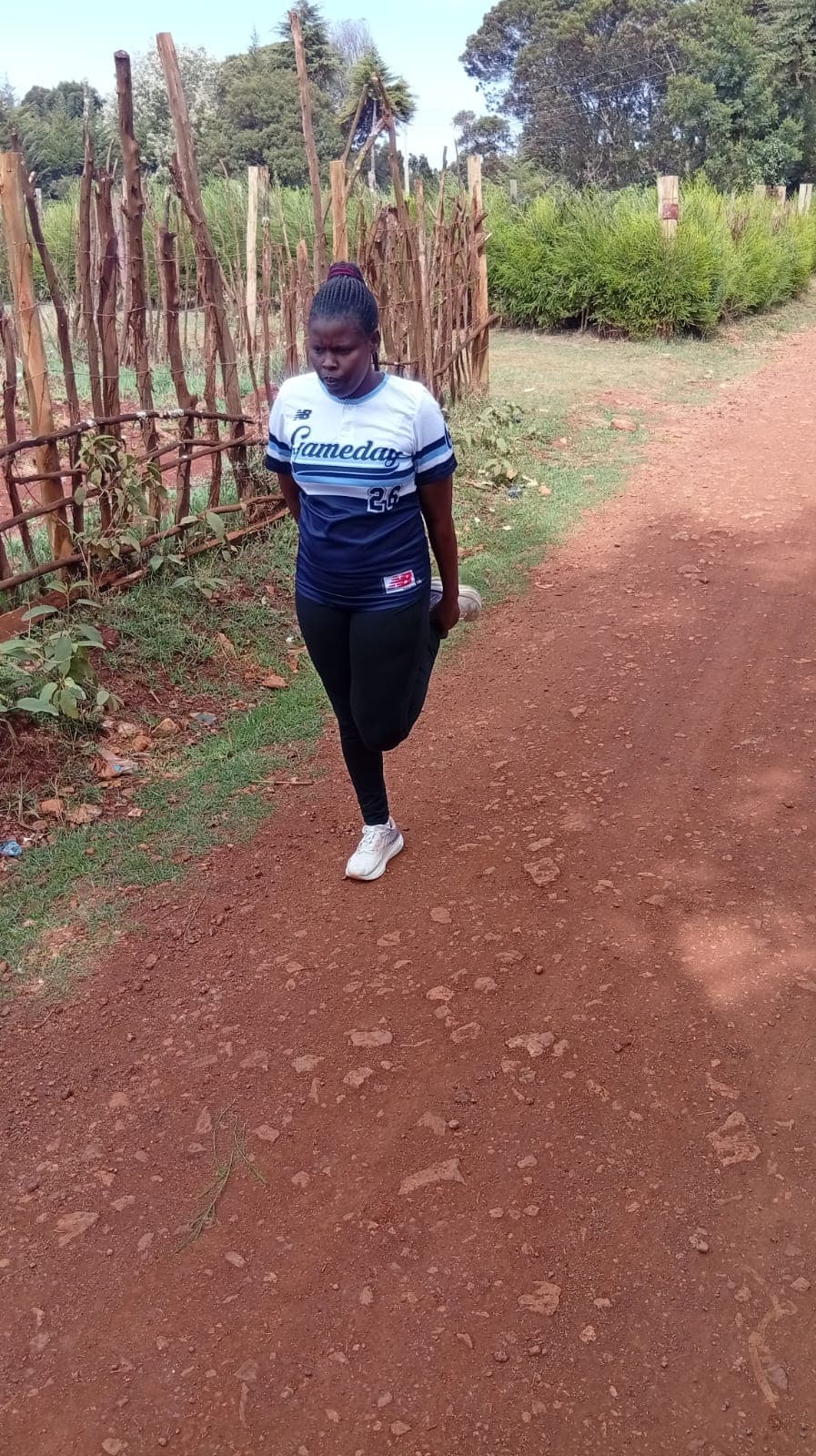 Jerotich Joan in athletic running gear